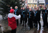 Singing next to the Christmas tree in Reigate