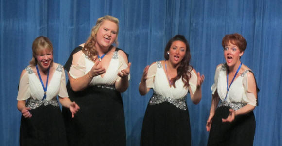 Domino, the 2014 Champion Women's Barbershop Quartet.